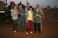 Foto: Safarigruppe beim „Sundowner Drink“ im privaten Wildreservat